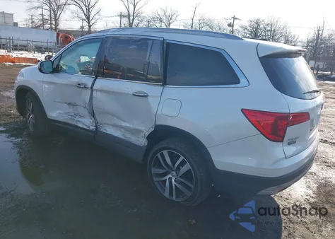 2018 Honda Pilot Touring z USA, uszkodzony, nr VIN 5FNYF6H90JB029797